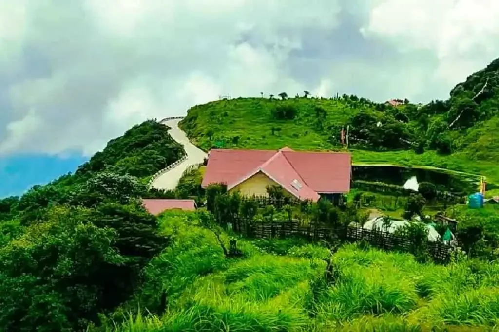 Green hillside settlement at Chitrey