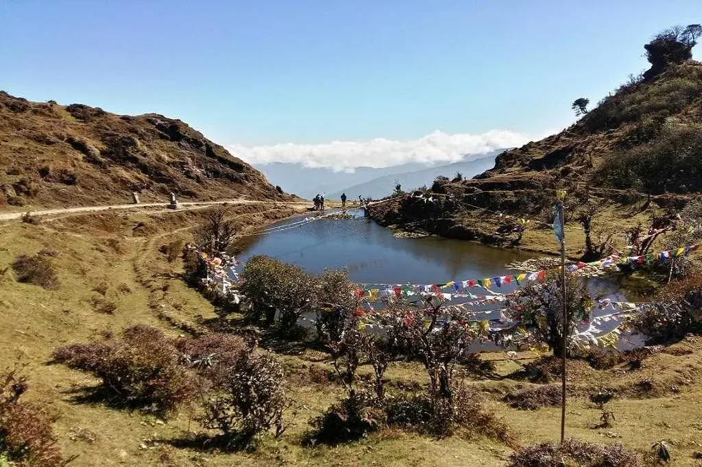 Kalapokhri lake and prayer flags