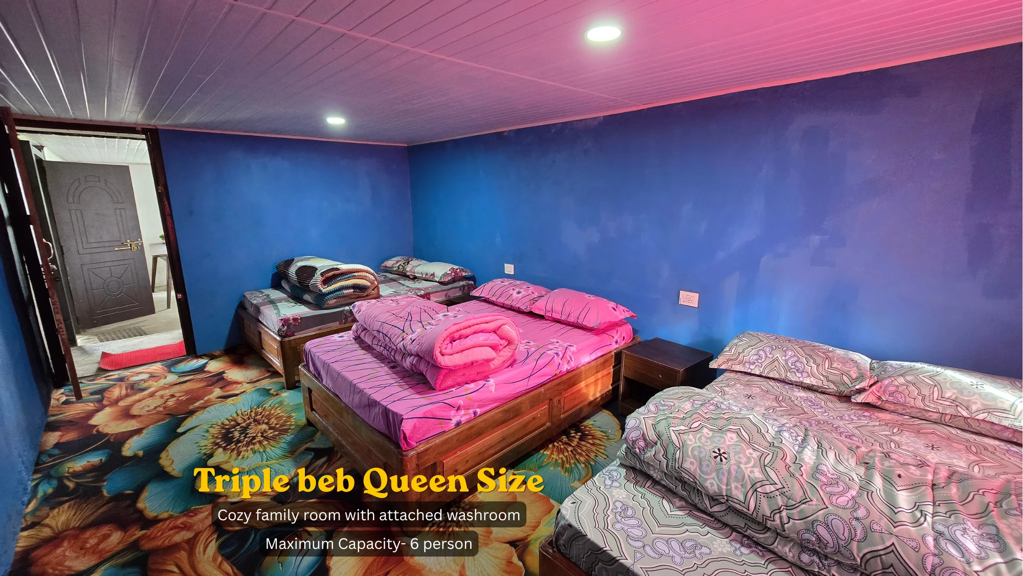 Triple queen-size room with attached washroom, capacity up to 6 guests